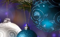 Close up of festive baubles on a tree